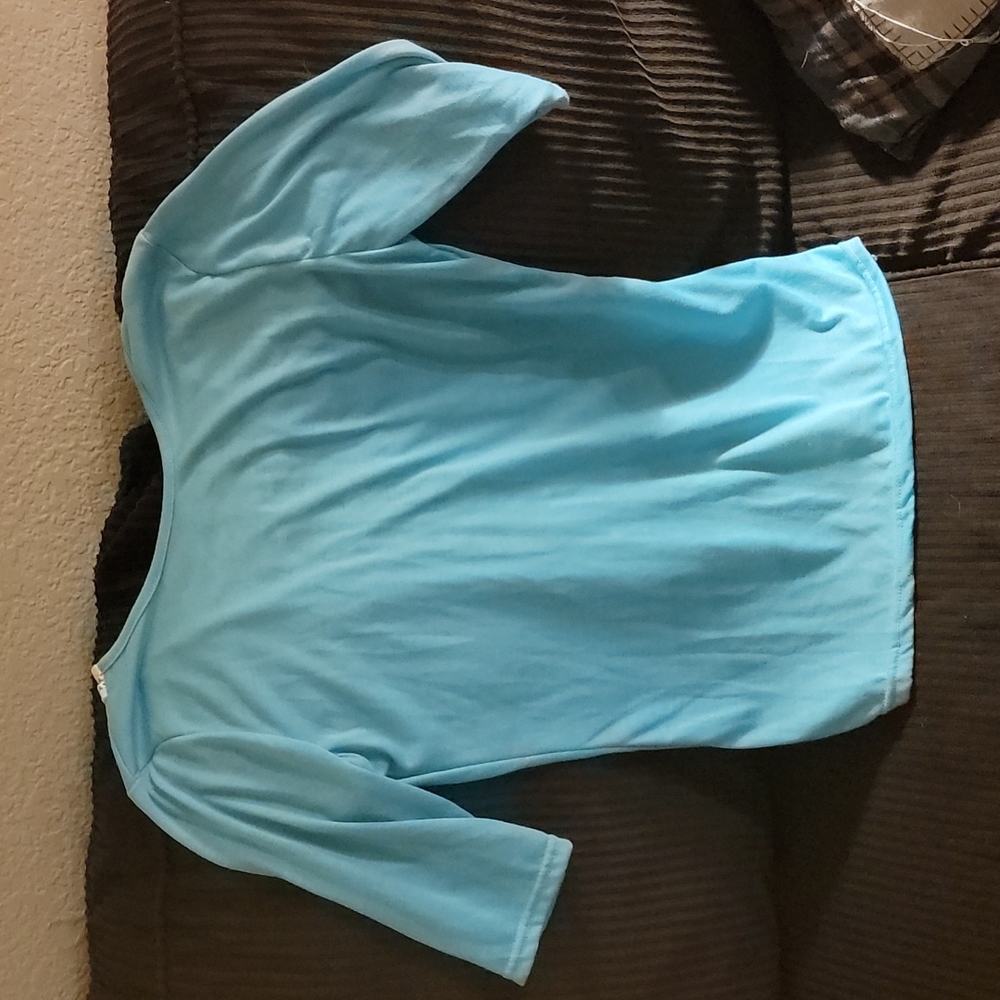 Small, teal with cream open back